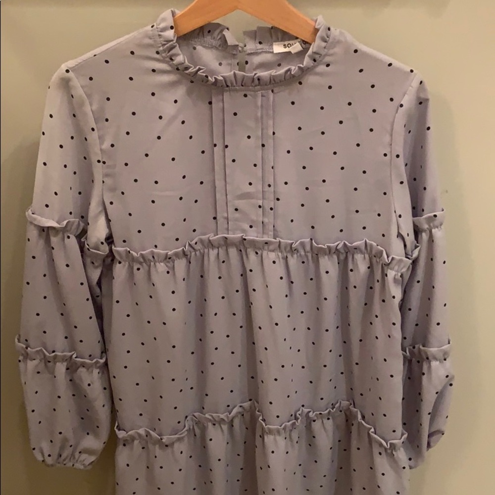 Polka dot dress with ruffles and ruffled collar